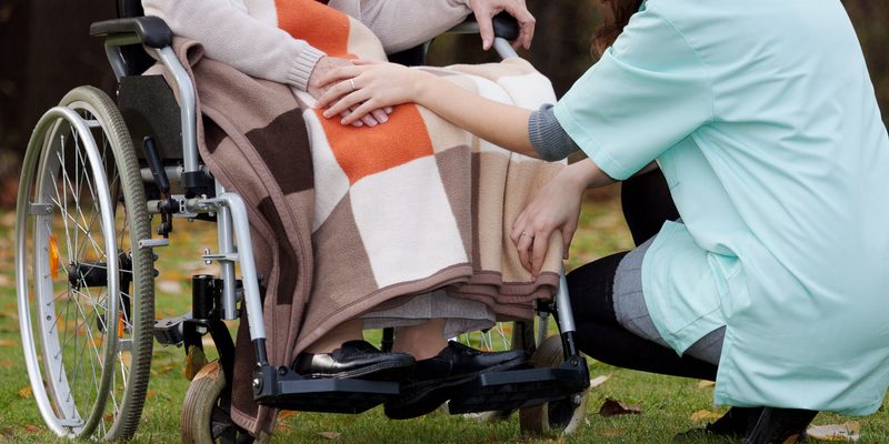 Disabled woman on a wheelchair being taken care of | Disabled Care in Bristol